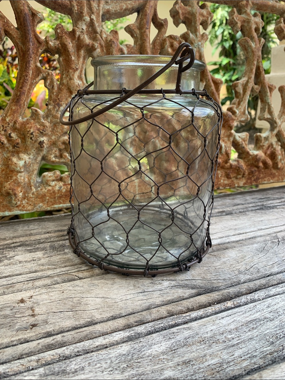 Clear Glass Lantern with Coppery Chicken Wire Cage with Handle